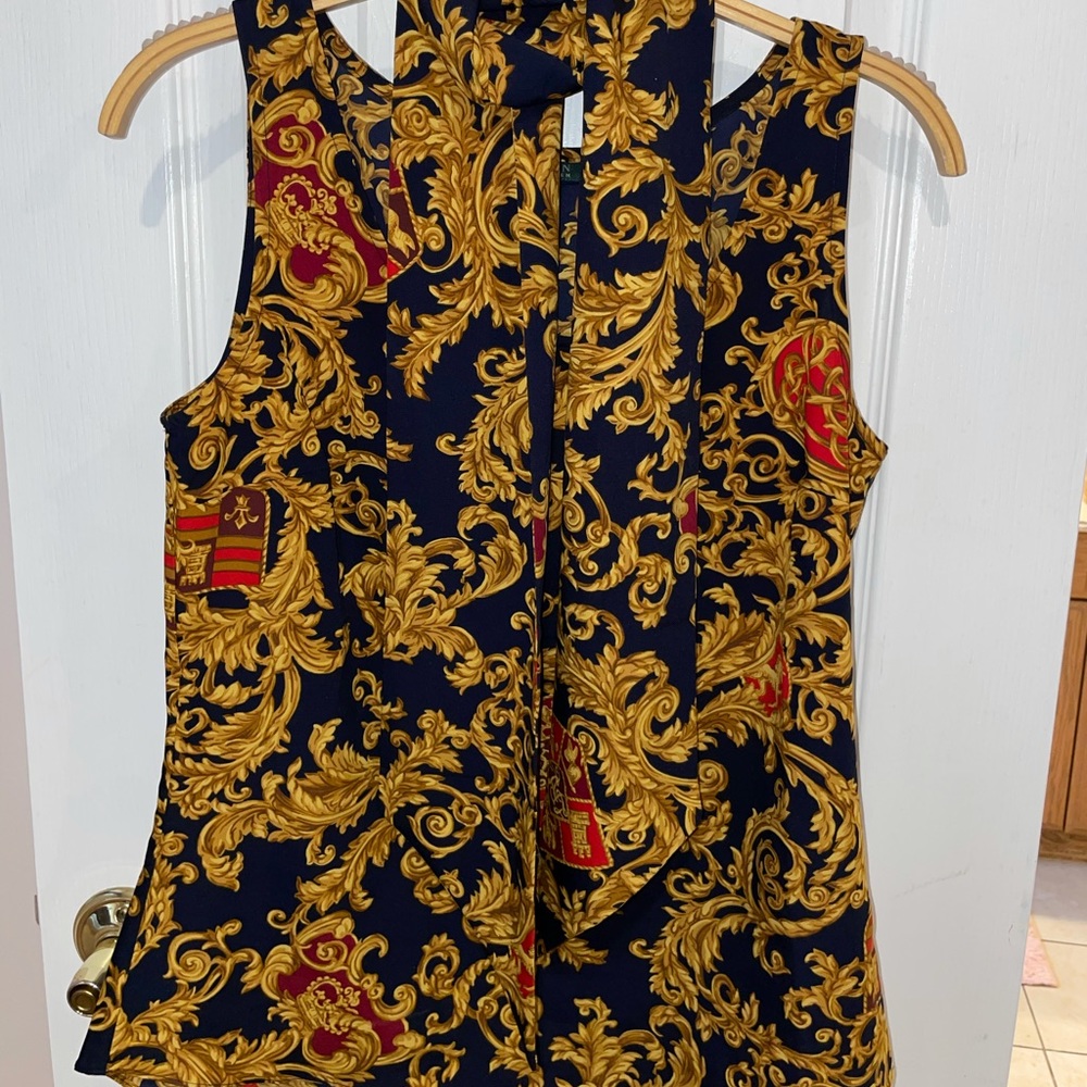 Top with a long skinny scarf